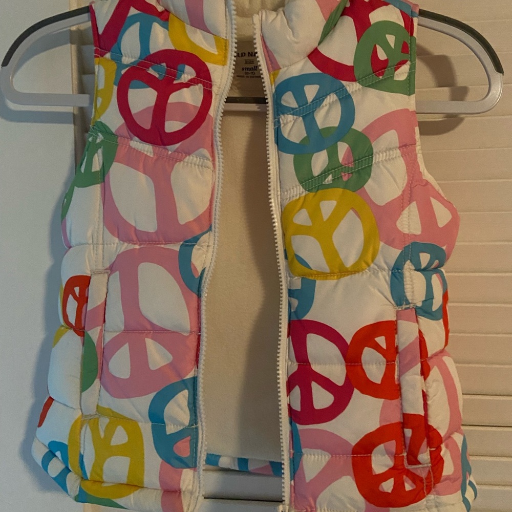Thick, girls vest with peace signs!